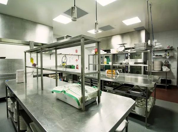 Commercial kitchen renovation showcasing a dedicated space for dish-washing and preparation, equipped to the highest standards.
