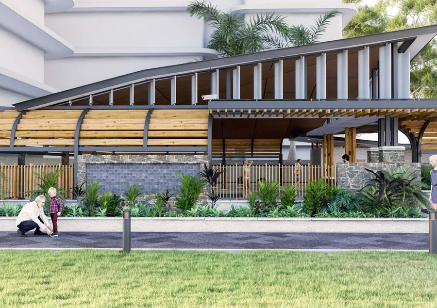 Northern view of the Burleigh Beach Tower's pool area showcasing a roof design inspired by the Burleigh Headland and lush garden beds connected by a stone pathway.