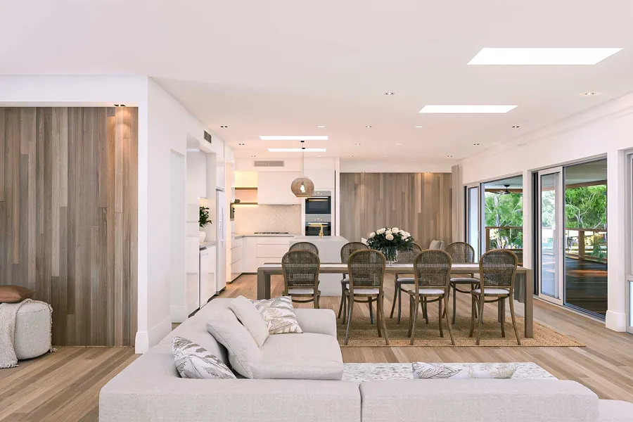 Image of the open plan living area of home featuring scalloped white wall cladding, timber floor and timber flooring