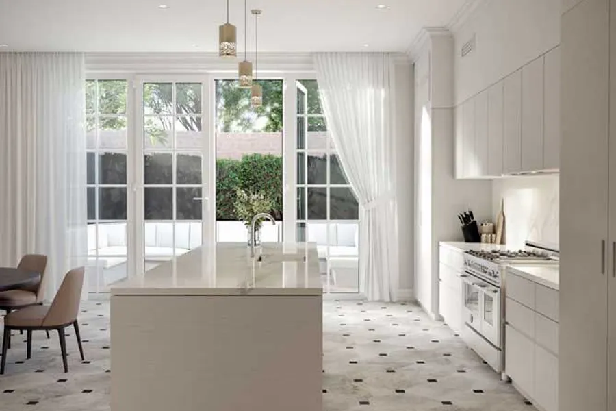 Sophisticated kitchen with a blend of classical French doors and contemporary cabinetry, accented by tessellated black and white flooring and a large marble kitchen bench.