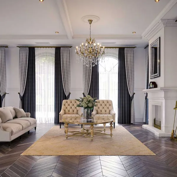 Elegant French Provincial-inspired formal living area, focusing on large drapes, herringbone hardwood floor, gold-detailed coffee table, and a statement chandelier.