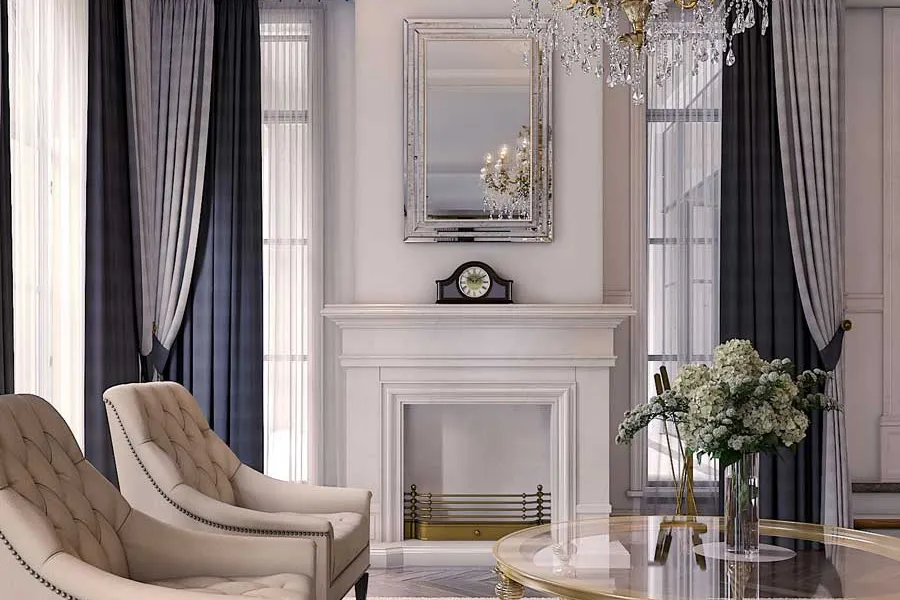 Close-up of the formal living area, highlighting the exquisite details around the fireplace, paired with a reflection from a grand mirror, and a glimpse of the luxurious chandelier.