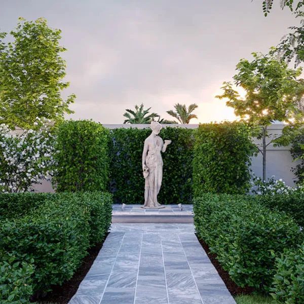 View from the middle of intersecting paths towards a classical statue, which serves as a central water feature, enclosed by tall hedging.