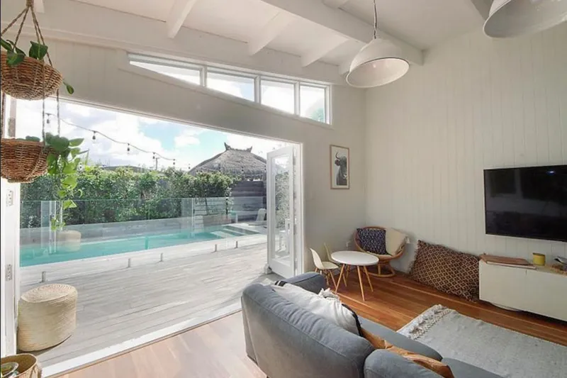 Beach house renovation - Rear extension living area opening to deck