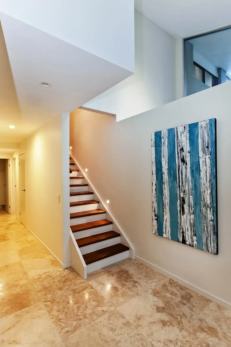 Lake View House Renovation - Designer bathroom featuring freestanding bath and premium finishes