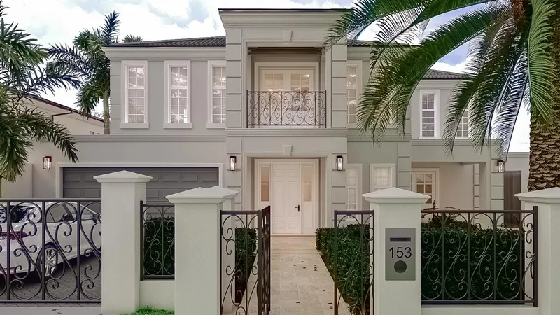 French Provincial Renovation - Entry portico with detailed columns and traditional architectural mouldings