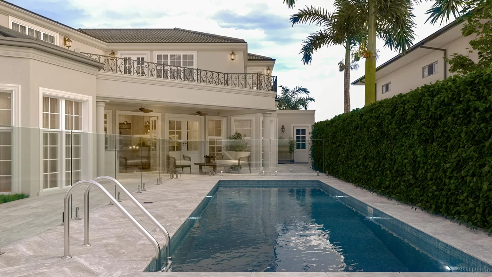 Waterfront pool view of the French Provincial Waterfront Transformation design by Burleigh Beach Designs