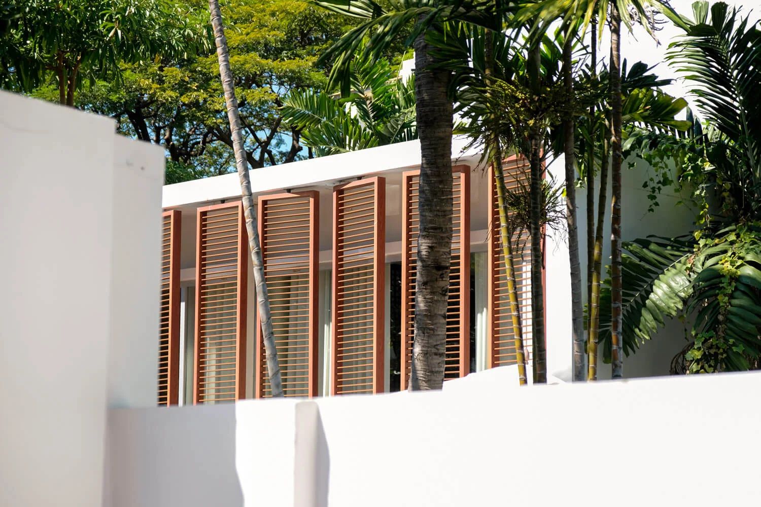Visually striking architectural space with lush greenery and warm lighting