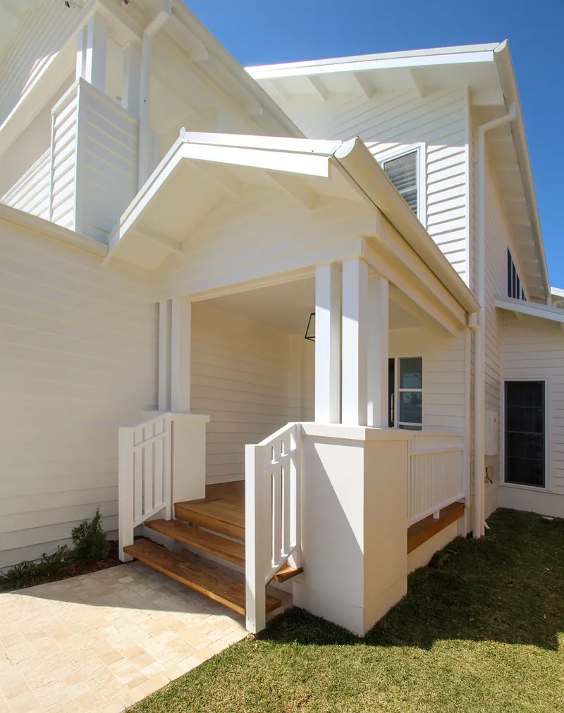 Mermaid Beach House - Contemporary front elevation with breezeway screening and sustainable timber cladding