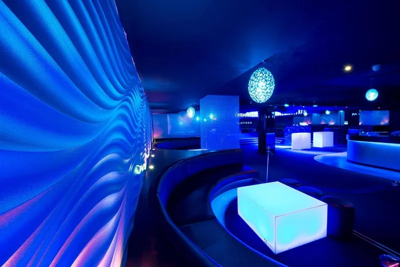 Plush booth seating area in Platinum Nightclub with ambient lighting