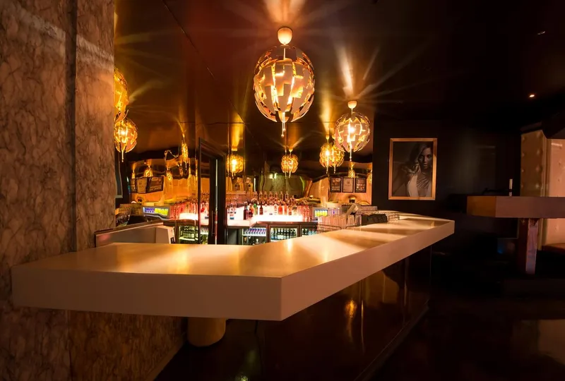 Platinum Nightclub central DJ booth with integrated sound and lighting systems
