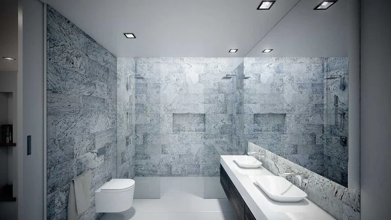 Modern bathroom shower illuminated naturally by a light well from above.
