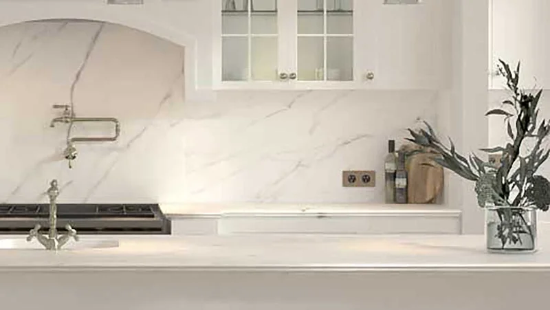 Kitchen splashback using the same marble as the benchtop for a luxurious finish.
