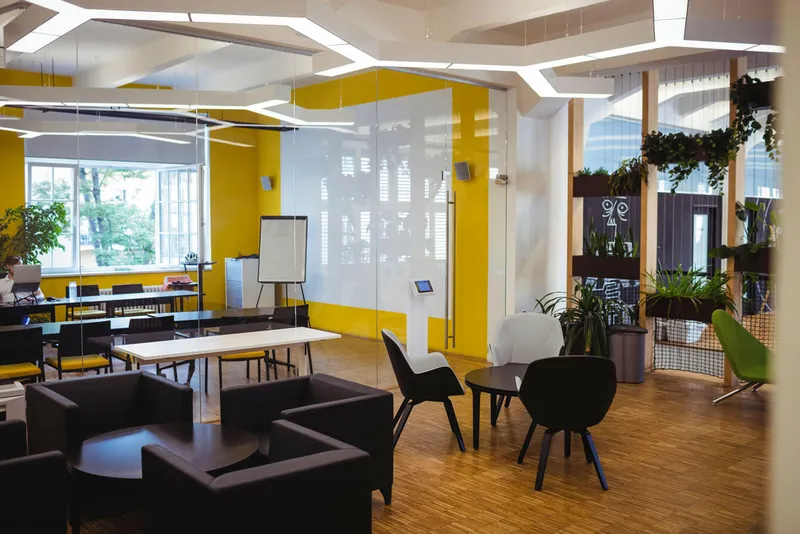 Acoustic treatment in a Gold Coast Queensland school showing ceiling baffles, wall panels, and furniture arrangement to optimize sound quality.