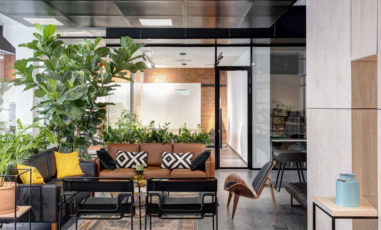 Biophilic design by Gold Coast architects featuring a living green wall in a modern Queensland building.
