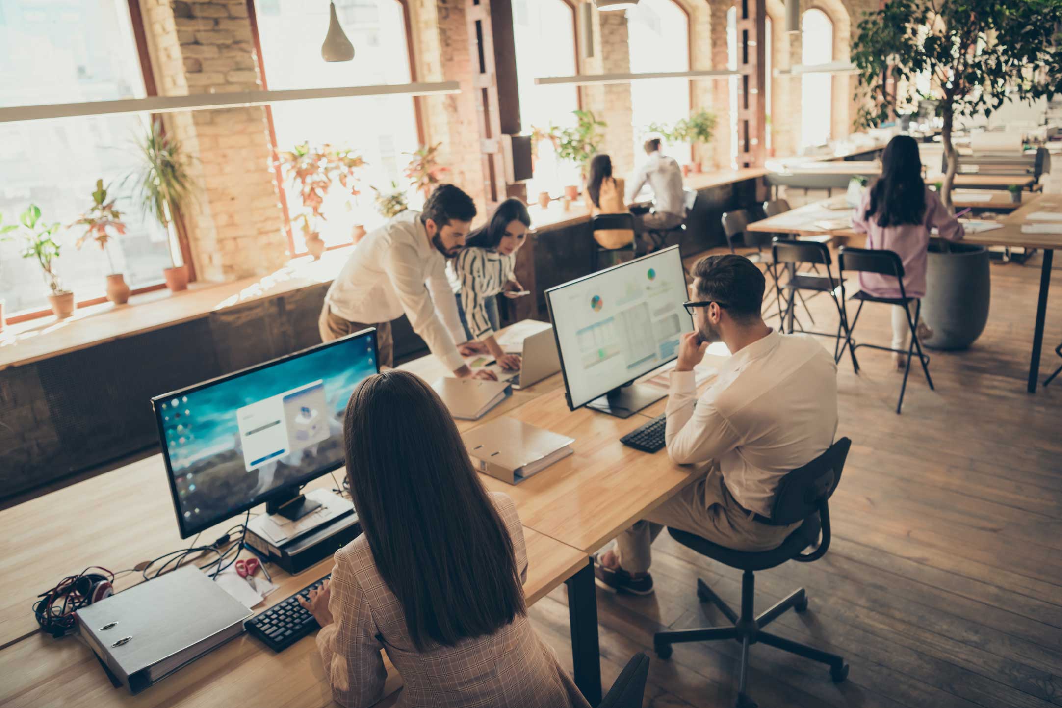 Modern hybrid workspace design with collaborative areas and technology integration for Gold Coast businesses.